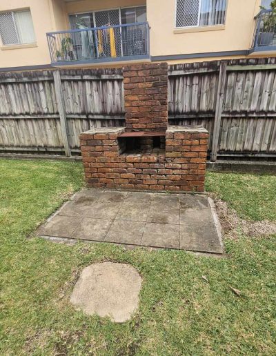 Fire place after pot plants and garbage removed