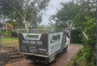 Shayes Rubbish Removals truck loading garden rubbish 